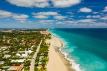 Aerial view of houses along the beach